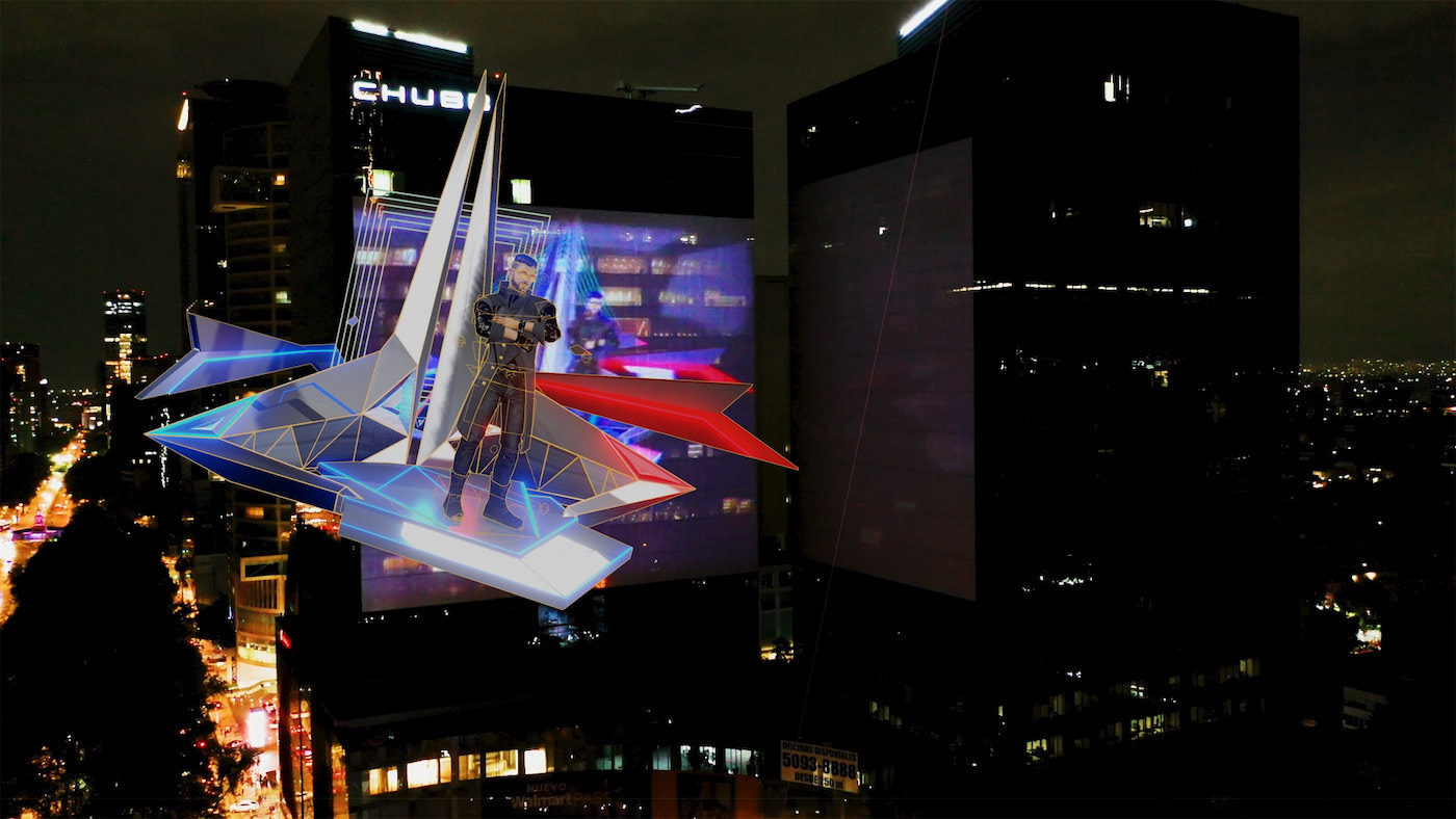 Proyección de video 3D en edificio en la noche