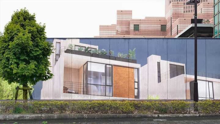 Barda con anuncio espectacular de casa en construcción